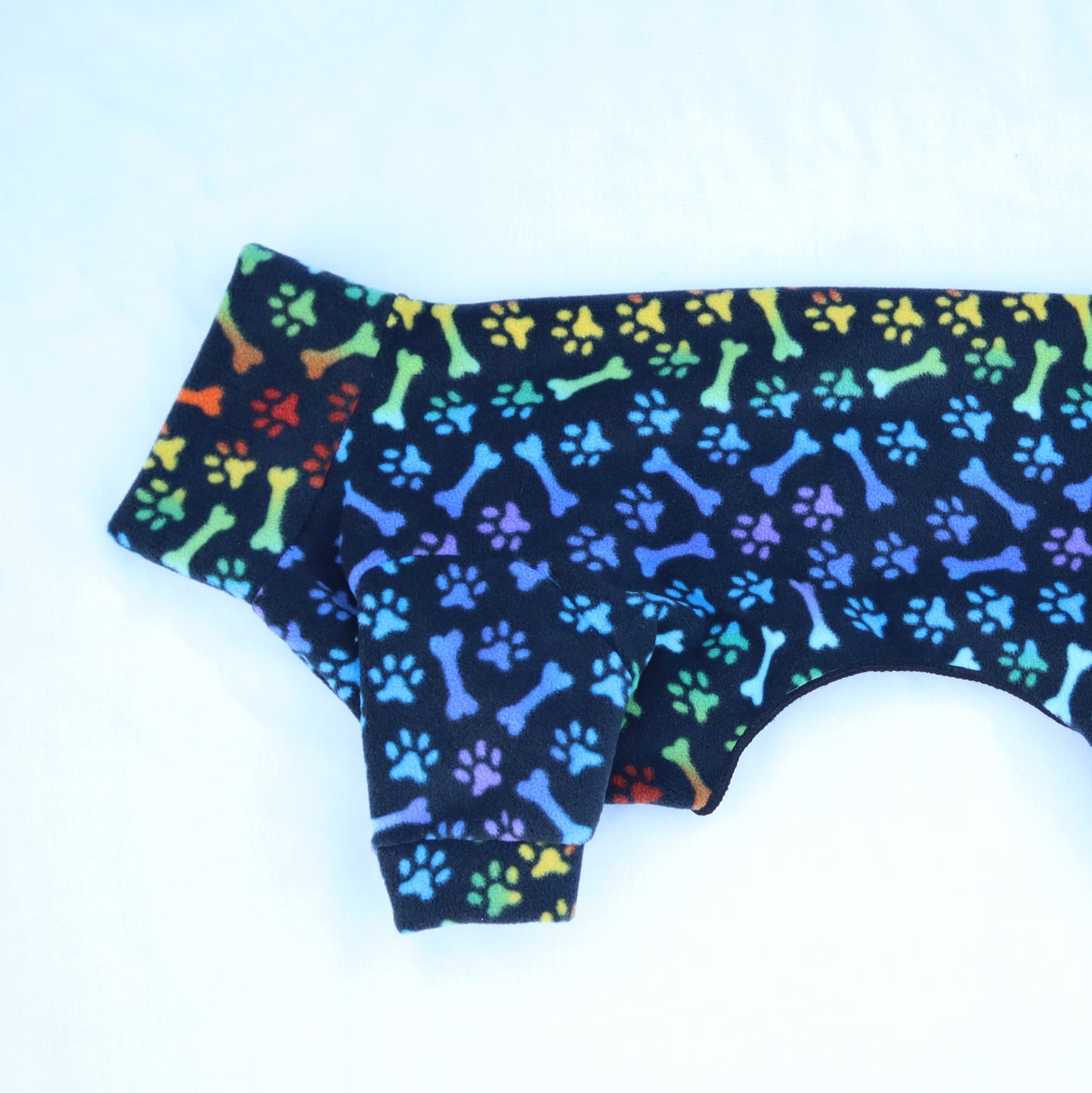 Waterproof Fleece Suit in Rainbow Paws & Bones Design Also Available as a Jumper or Coat
